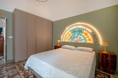 Image de GuestHost - Colourful Monopoli Apartment