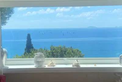 Image de Maison de vacances 'Punta Rossa Escape Villa' avec vue sur la mer, terrasse privée et Wi-Fi