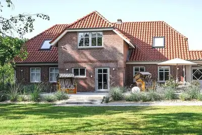 Image de Maison de vacances à Fehmarn avec piscine