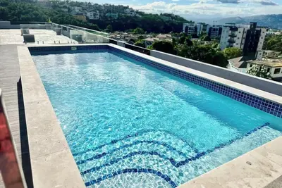 Image de 2bdrm • 24hrs Security • Top floor with Mountain View • Rooftop Pool and Gym