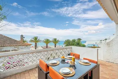 Image de Beachfront Apartment with Sea View Balcony Luz