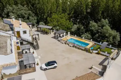 Image de Maison de campagne 'Cuevas 3' avec vue montagne, piscine commune et Wi-Fi
