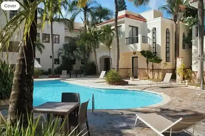 Image de Bright and peaceful 2-bedroom apartment with pool just steps from the beach