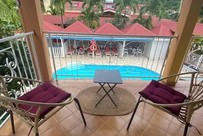 Image de Homerez - Appart Pointe-Noire, piscine.