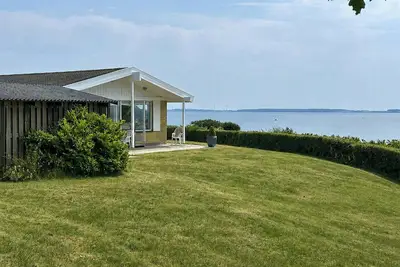 Image de Maison de vacances en première ligne avec vue sur la mer à Røsnæs