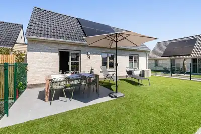 Image de Maison pêcheur élégante avec abri pour vélos