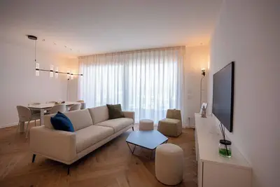 Image de Appartement avec Wifi, bain à remous, climatisation, terrasse, animaux admis, vue panoramique