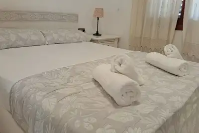 Image de House in Sagunto. Perfect for families or friends. Air Conditioning, Wi-Fi, Arcade Games.
