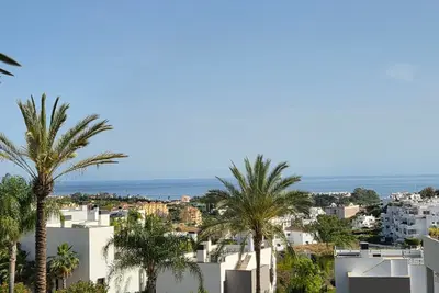 Image de Appartement avec jardin. Golf et mer à Estepona