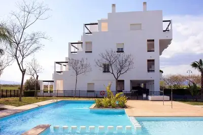 Image de Bel appartement 2 chambres au Condado de Alhama Golf Resort avec piscines, climatisation, Wifi