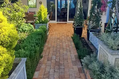 Image de Quaint 2-bedroom cottage in Cape Town perfect for a peaceful stay.