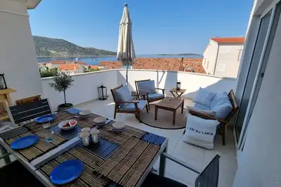 Image de Appartement de deux chambres avec le balcon et la vue sur le mer Primosten (A-27875-a)