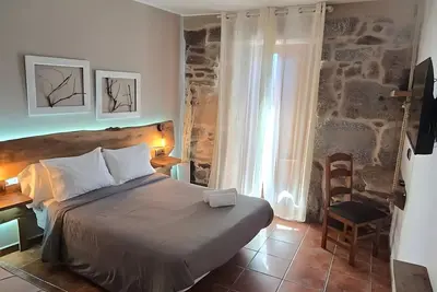 Image de Chambre « Double Deluxe Cuarzo » avec vue montagne, terrasse partagée et Wi-Fi