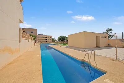 Image de Appartement 'Ático Vacacional' avec piscine partagée, balcon et climatisation