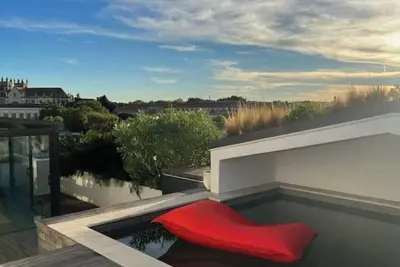 Image de Toit terrasse avec piscine plein centre-ville