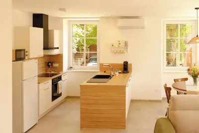 Image de Au Repos Des Fermiers - 55 m² - Parking privé et sécurisé - 5 min Route des vins