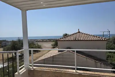 Image de 1er étage dans villa bord de mer avec toit terrasse et vue imprenable