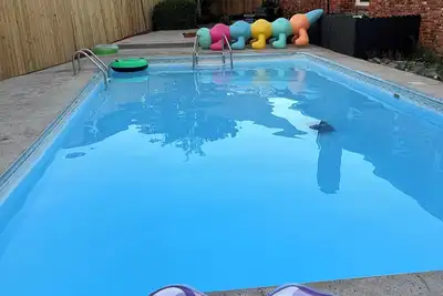 Welcome to Woosah. King size bed with a pool.