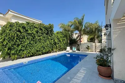 Image de Konnos Retreat 3br - walk to beach