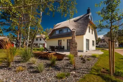 Image de House with a fireplace and sauna, about 500 m from a sandy beach, 4 bedrooms, sleeps up to 8, Wi-Fi