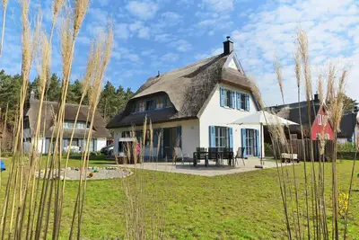 Image de Vacation home with a fireplace and sauna, about 500 meters from the sandy beach; dogs are welcome