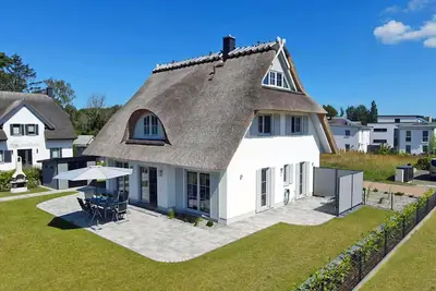 Image de House with a fireplace and sauna, about 1, 300 m from a sandy beach, 4 bedrooms, sleeps up to 8, Wi-Fi