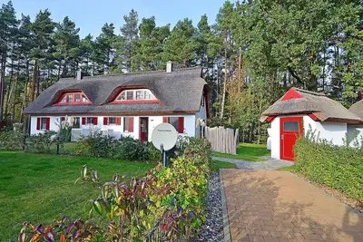 Image de Half of a vacation home with a fireplace and sauna, right next to the forest, about 500 meters from the sandy beach