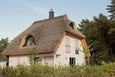 Image de Vacation home with a fireplace, about 160 meters from the sandy beach, with Wi-Fi and a washing machine
