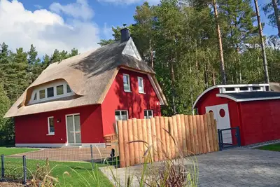 Image de Vacation home with a fireplace and sauna, about 300 meters from the sandy beach; pets welcome