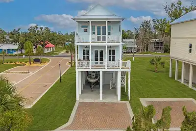 Image de Nouvelle maison Estuaire 4 chambres 3 salles de bain dort 10 avec place bateau et piscine