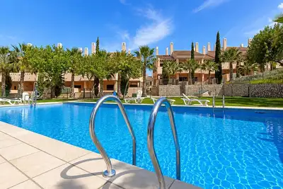 Image de Luxury apartment with pool views from a large terrace on world class golf resort