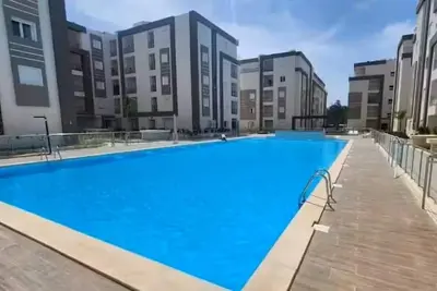 Image de Appart haut-standing salon et 2 chambres à coucher à quelques mètres de la plage