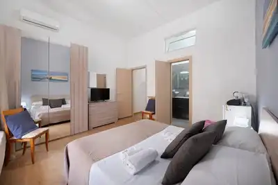 Image de Home Joséphine - Caserta - Chambre quadruple avec salle de bain privée
