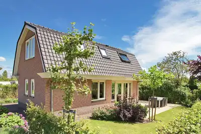 Image de Maison de Vacances à Noordwijk avec Jardin Ensoleillé