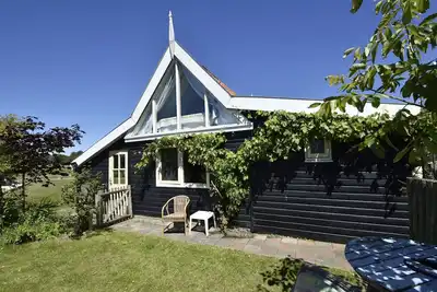 Image de Maison de meunier atmosphérique à 't Zand avec une belle vue