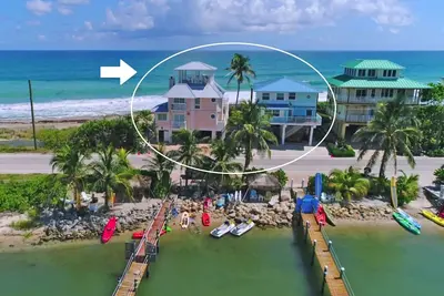 Image de Plages jumelles: 2 maisons sur l'océan \/ sur la rivière + quais privés, bains à remous et plus encore!
