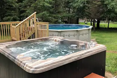 Image de Maison moderne, Hot Tube, lacs, piscines, parcs aquatiques, ski, tennis A / C WiFi gratuit