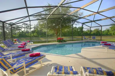 Image de Vues sur le lac, piscine au sud, à quelques minutes de Disney, pour 20 personnes, 3 chambres doubles King Master