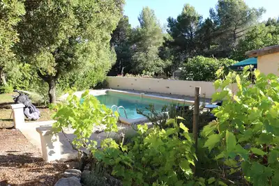 Image de Gîte classé ***Climatisée 110m2, très calme, arboré, piscine, pool house équipé