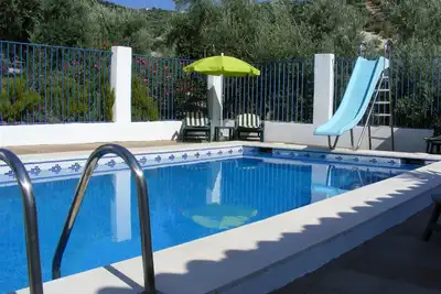 Image de Ferme avec piscine privée et vue imprenable sur le lac Iznajar Wifi