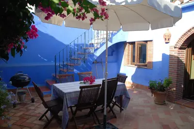 Image de Une maison de la maison au coeur du village avec wifi gratuit, espagnol et Uk Tv