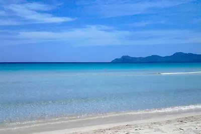 Image de Appartement à 50m à pied de la plage, avec wifi et Aacc central mais calme