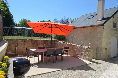 Image de Gîte en pierre tout confort, jardin clos, fibre, à 3 min d'Arromanches