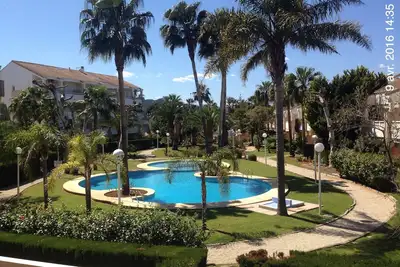 Image de Bel appartement 3 chambres avec parking privé, jardins, piscines, à la plage
