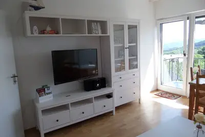 Image de Moderne appartement confortable avec balcon et vue magnifique.