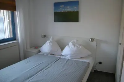 Image de Appartement moderne pour 2 personnes directement sur la plage - WiFi gratuit