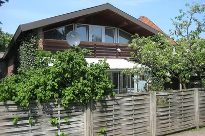Image de grand appartement près de la mer du Nord avec véranda, cheminée, sauna