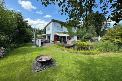 Image de Luxueux chalet sur le Canal Ems-Jade, comme animaux de compagnie, une piscine extérieure, cheminée