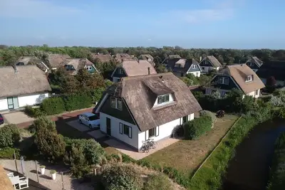 Image de Top villa en bord de mer, cheminée, sauna, Wifi, lits fraîchement préparés, y compris le nettoyage final
