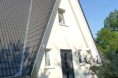 Image de Maison de vacances de haute qualité et confortable, sauna, à 150m de la plage, endroit calme et naturel